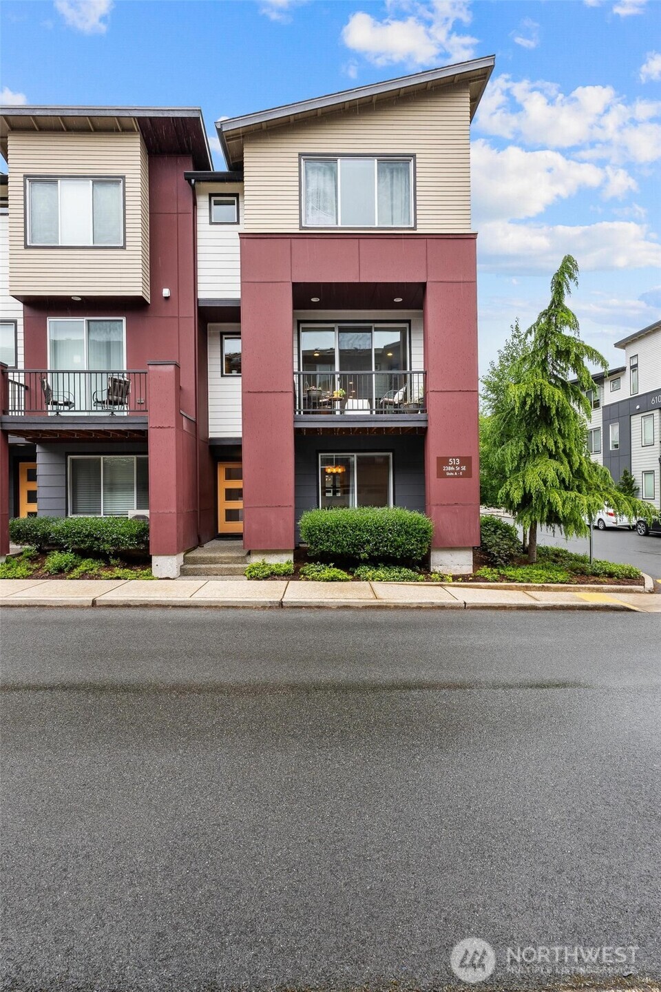 513 238th Street Southeast, Unit A Bothell, WA 98021 - Photo 3 of 31 front view of building with a street