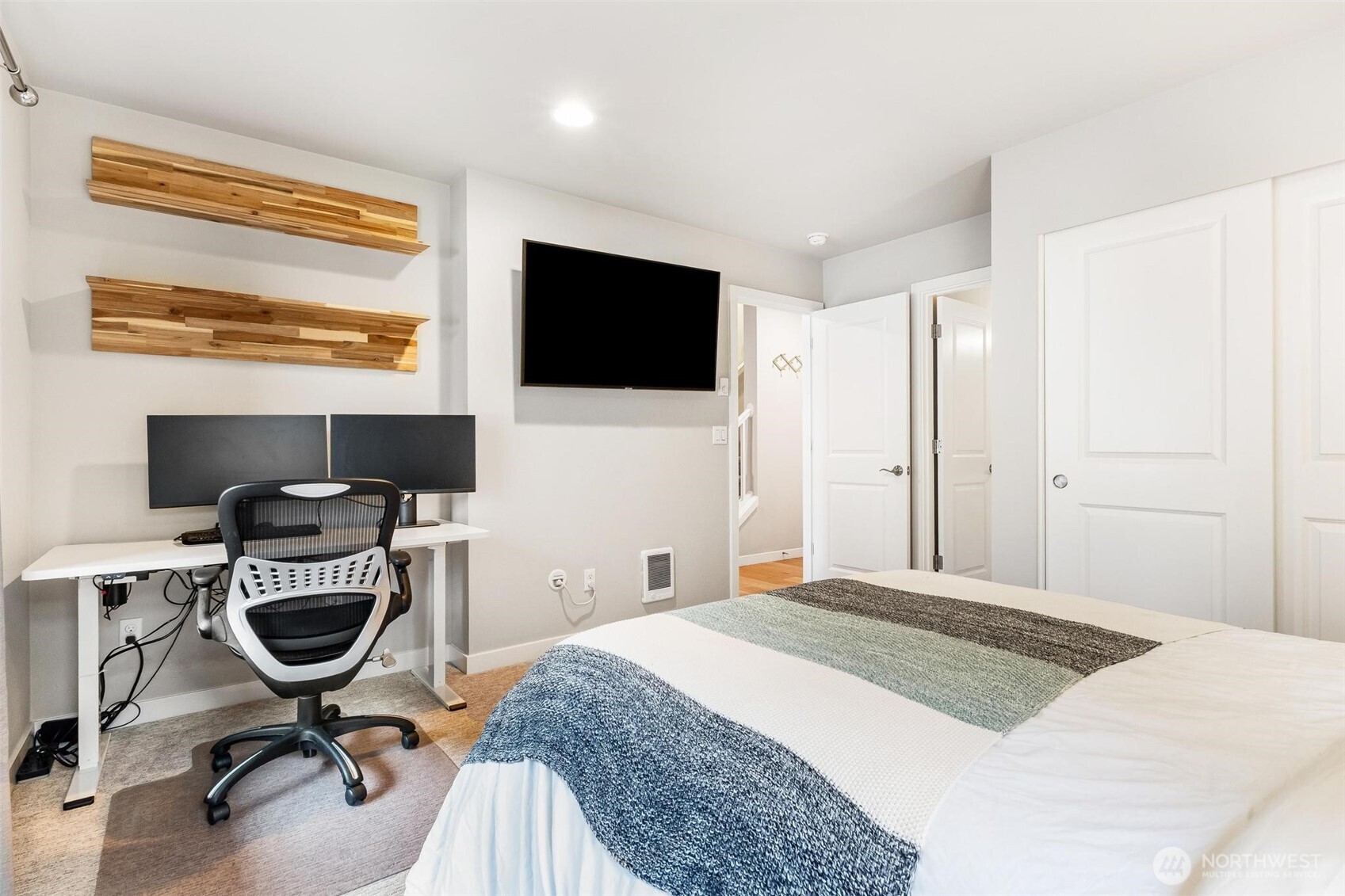 513 238th Street Southeast, Unit A Bothell, WA 98021 - Photo 9 of 31 a bedroom with a workspace