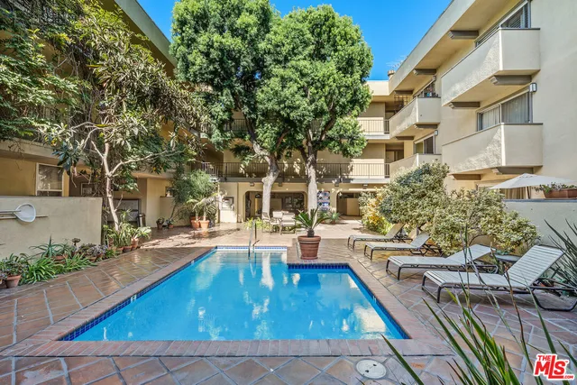 a view of a house with swimming pool