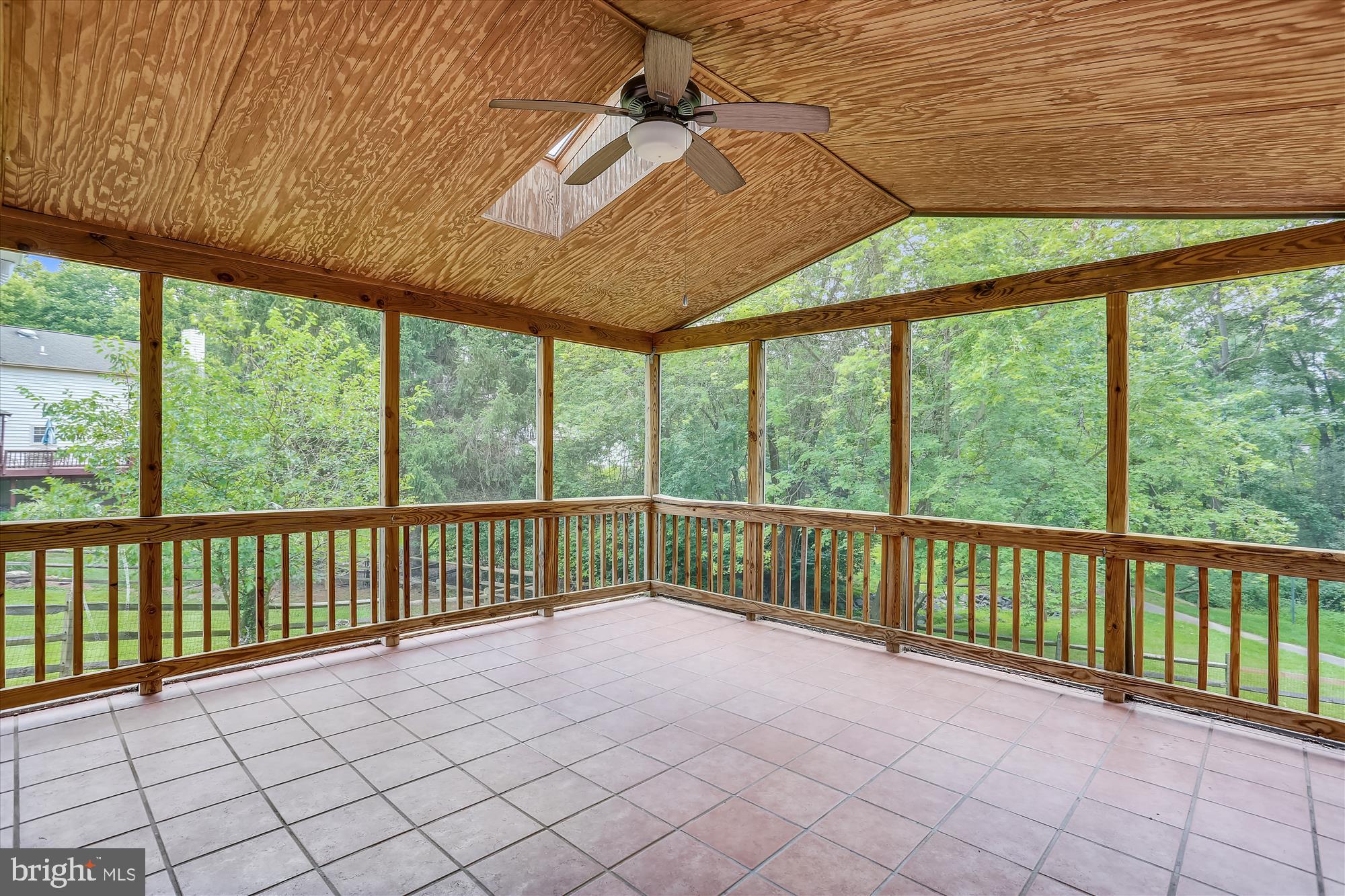 8908 Spring Berry Court Gaithersburg, MD 20886 - Photo 19 of 59 Screen Porch with ceiling fan off main level