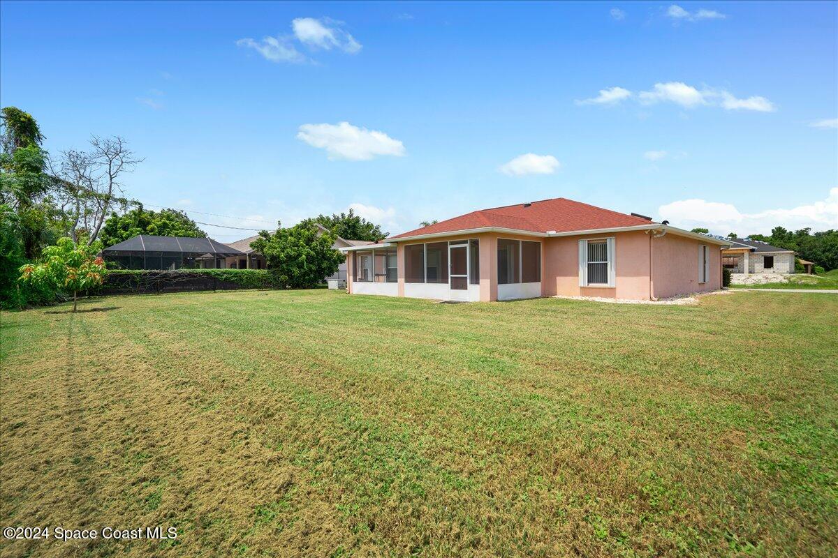 488 Abello Road Southeast Palm Bay, FL 32909 - Photo 33 of 35 Backyard with Oversized Lot
