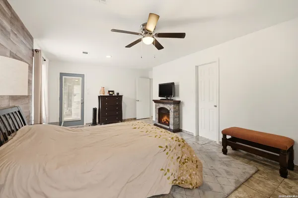 a living room with furniture rug and wooden floor