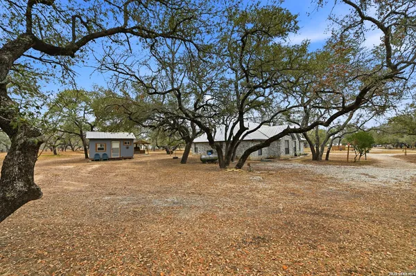 an aerial view of residential house with parking space