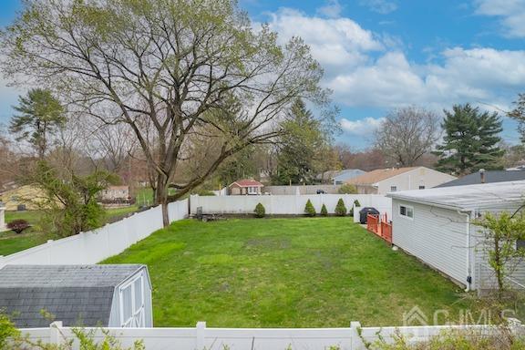 92 Kendall Road Kendall Park, NJ 08824 - Photo 25 of 28 view of yard with an outdoor structure