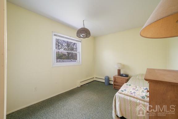 92 Kendall Road Kendall Park, NJ 08824 - Photo 10 of 28 carpeted bedroom with a baseboard radiator