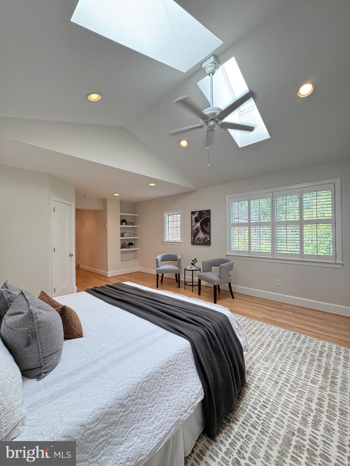 3293 Worthington Street Northwest Washington, DC 20015 - Photo 15 of 45 a bed room with a bed and a chandelier