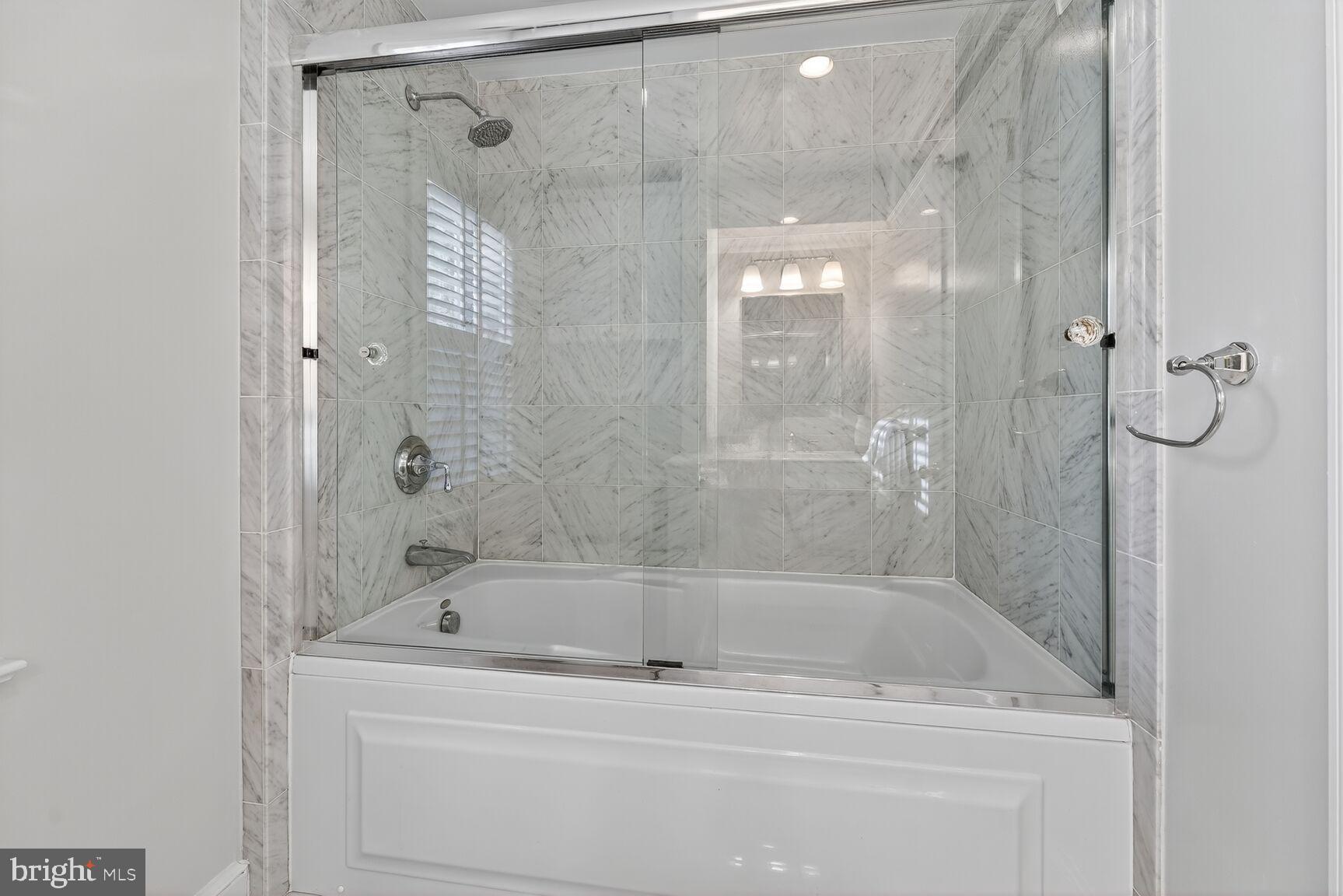 3293 Worthington Street Northwest Washington, DC 20015 - Photo 16 of 45 a bathroom with a bathtub