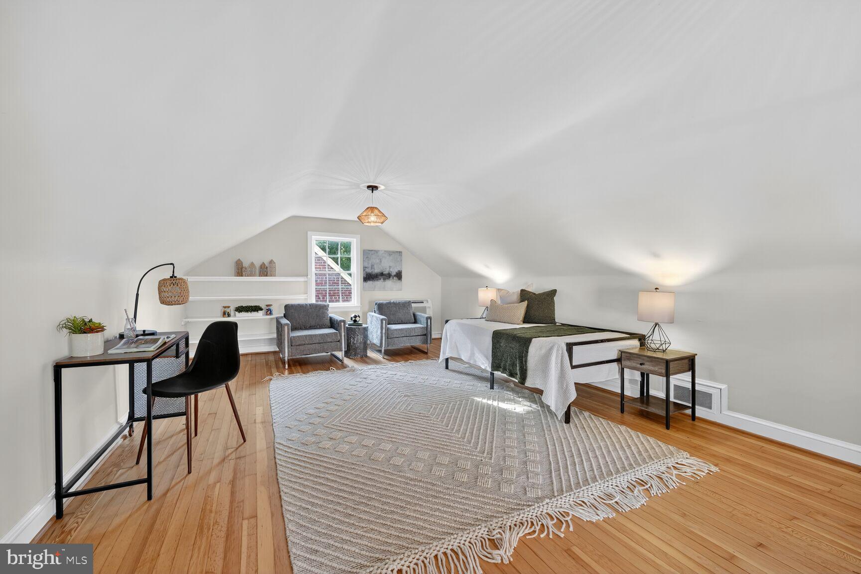 3293 Worthington Street Northwest Washington, DC 20015 - Photo 24 of 45 a living room with furniture and a wooden floor