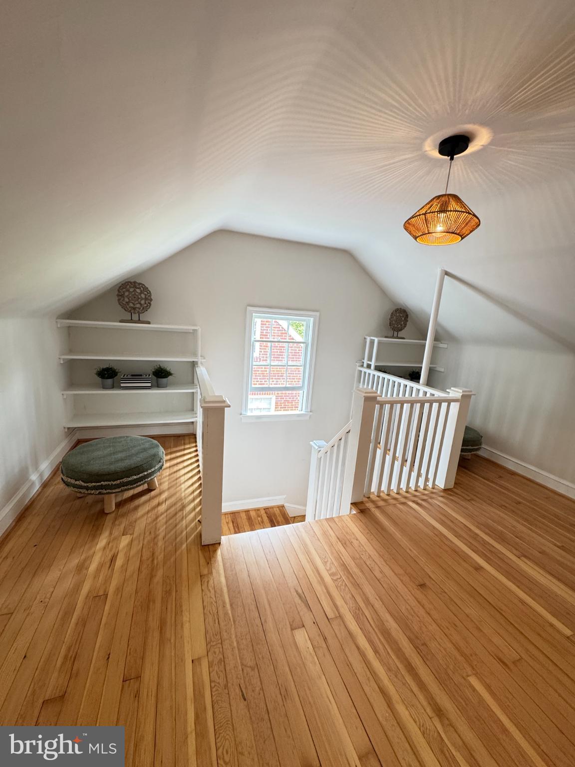 3293 Worthington Street Northwest Washington, DC 20015 - Photo 26 of 45 a bedroom with a bed and a chandelier