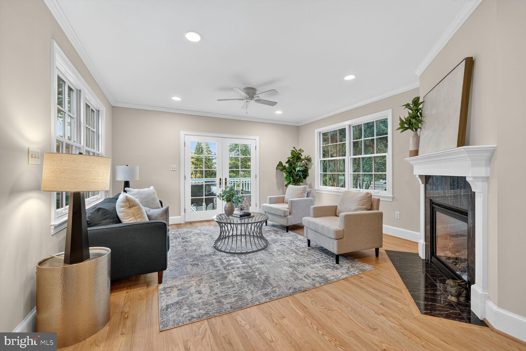3293 Worthington Street Northwest Washington, DC 20015 - Photo 3 of 45 a living room with furniture and a fireplace