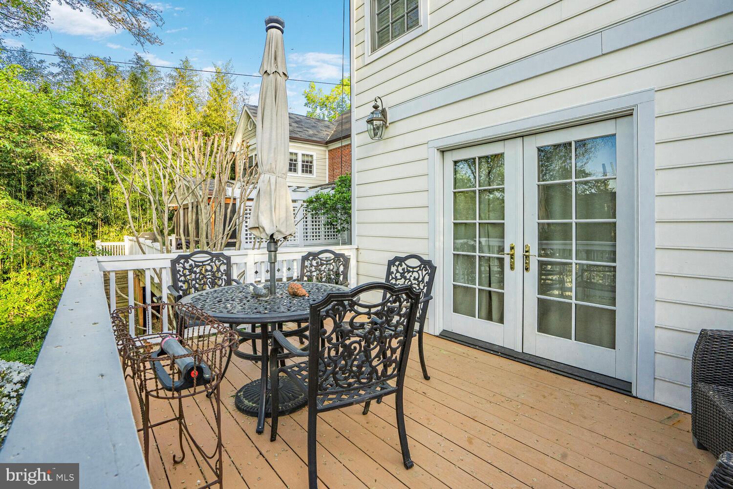 3293 Worthington Street Northwest Washington, DC 20015 - Photo 31 of 45 a view of a balcony with table and chairs