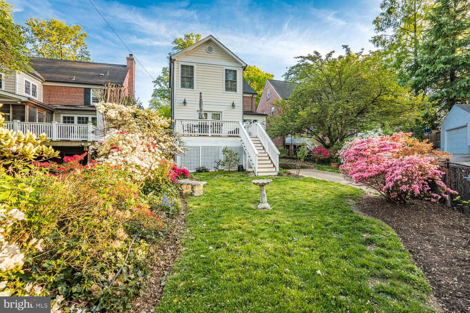 3293 Worthington Street Northwest Washington, DC 20015 - Photo 34 of 45 a front view of a house with garden