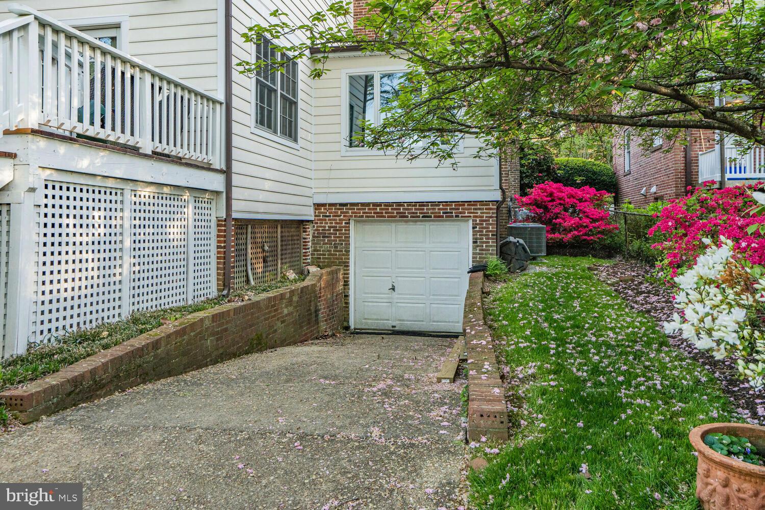 3293 Worthington Street Northwest Washington, DC 20015 - Photo 36 of 45 a front view of a house with a yard
