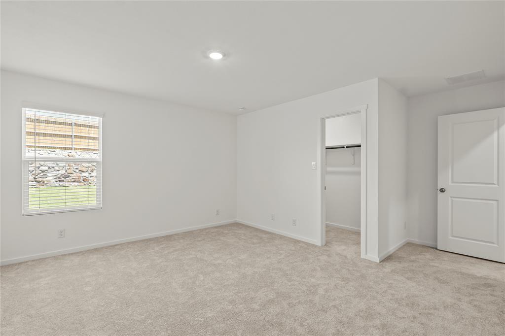 1138 Barbary Flds Street Forney, TX 75126 - Photo 14 of 25 Room with light-colored carpeting, white walls, and a recessed ceiling light