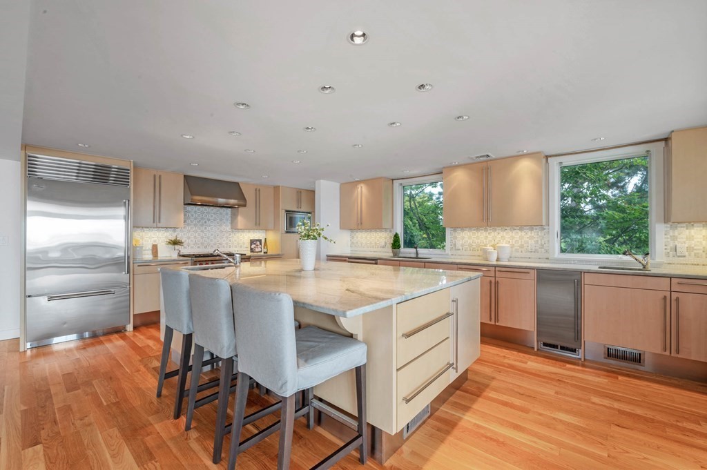 13 Goldthwait Road Marblehead, MA 01945 - Photo 12 of 40 a kitchen with a sink window and cabinets