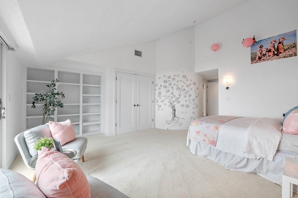 13 Goldthwait Road Marblehead, MA 01945 - Photo 28 of 40 a bedroom with a bed and a couch