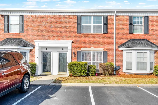 a front view of a house having yard