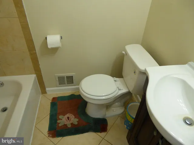 a view of a small space with wooden floor