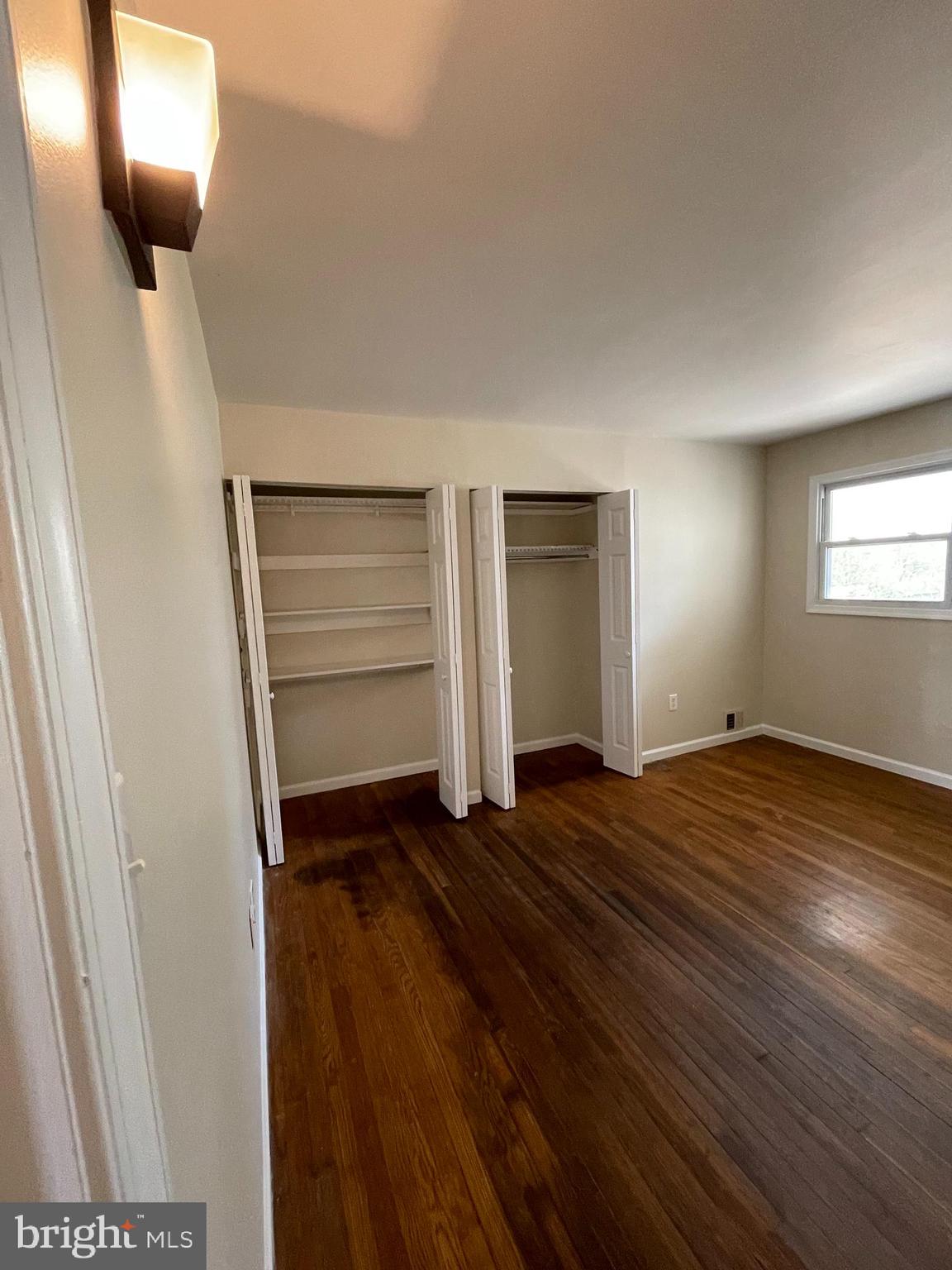 903 Regency Road Woodbridge, VA 22191 - Photo 21 of 38 a view of empty room with wooden floor