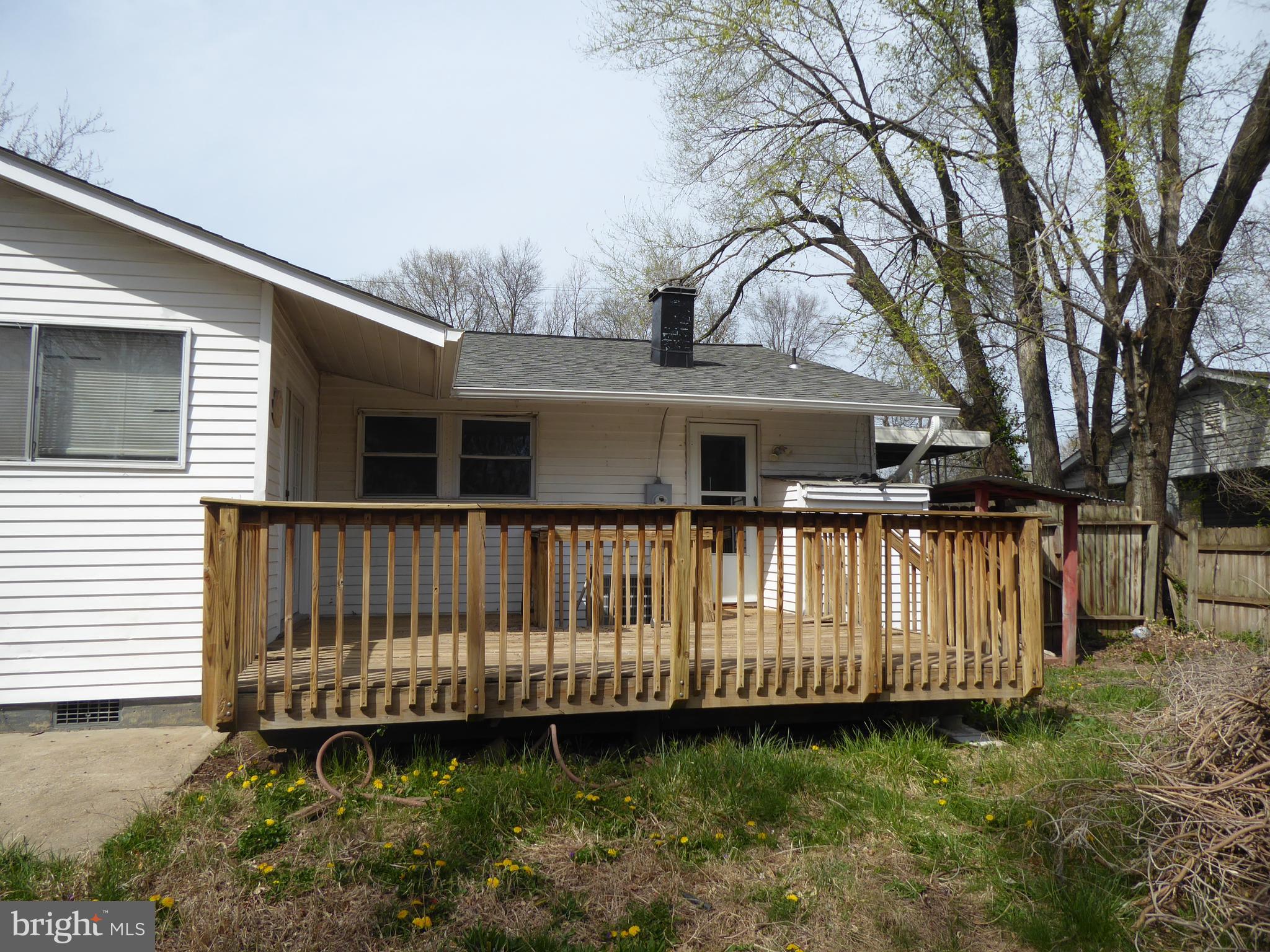 903 Regency Road Woodbridge, VA 22191 - Photo 34 of 38 a view of a house with wooden fence