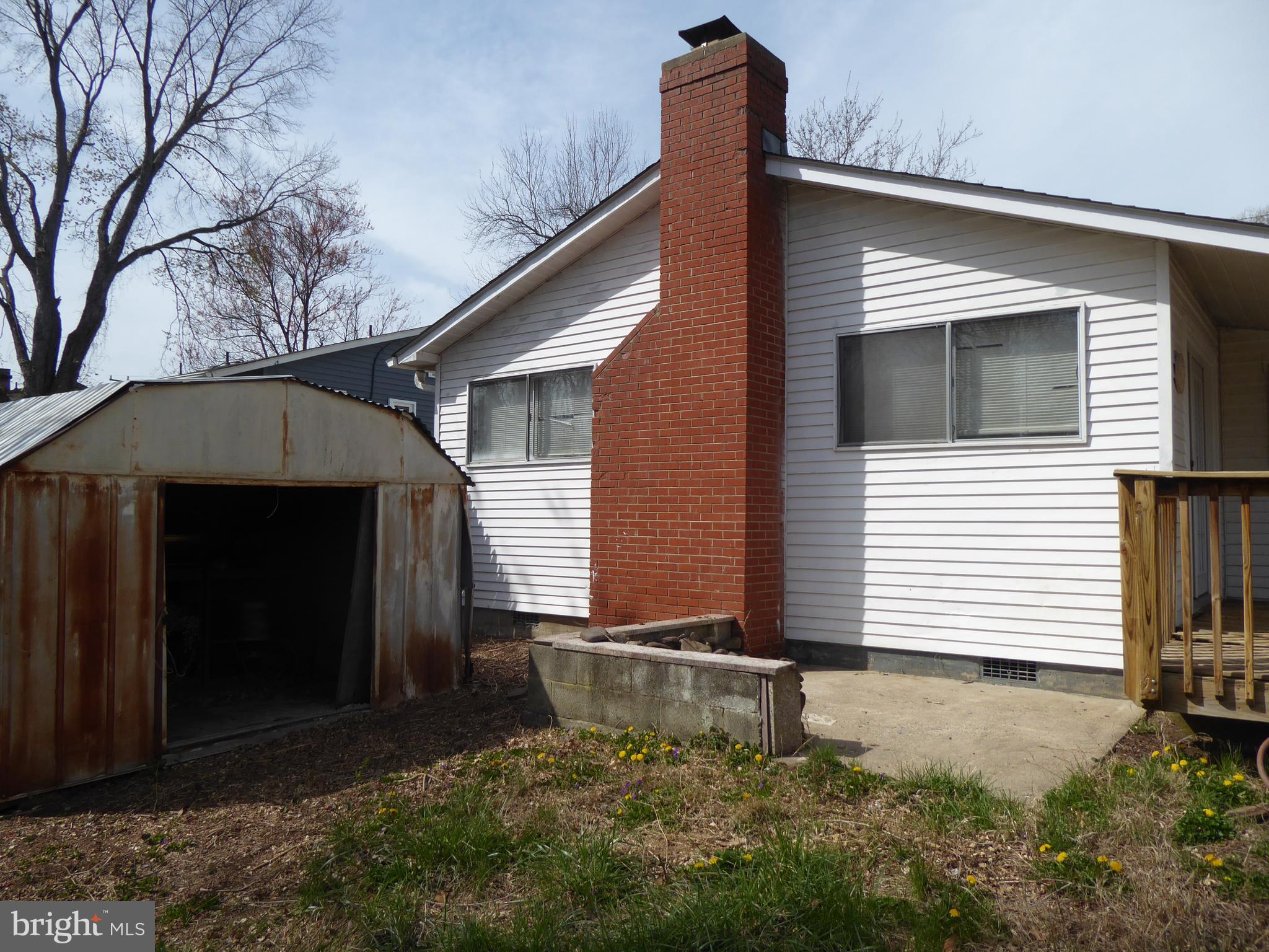 903 Regency Road Woodbridge, VA 22191 - Photo 35 of 38 a front view of a house with a yard