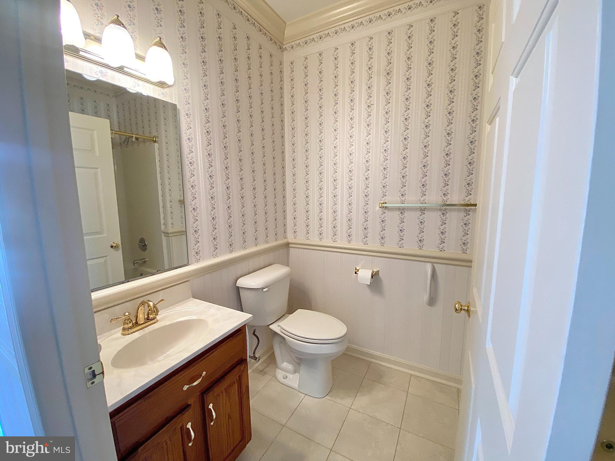 1476 Spring Side Drive East Chambersburg, PA 17202 - Photo 20 of 27 a bathroom with a sink a toilet and shower