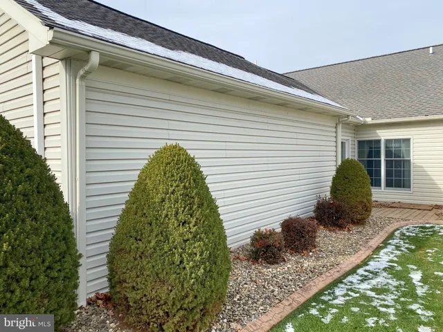 a backyard of a house with green space