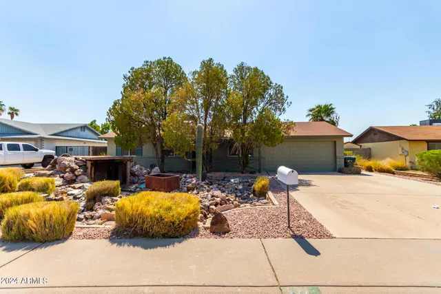 a cars parked in front of a house