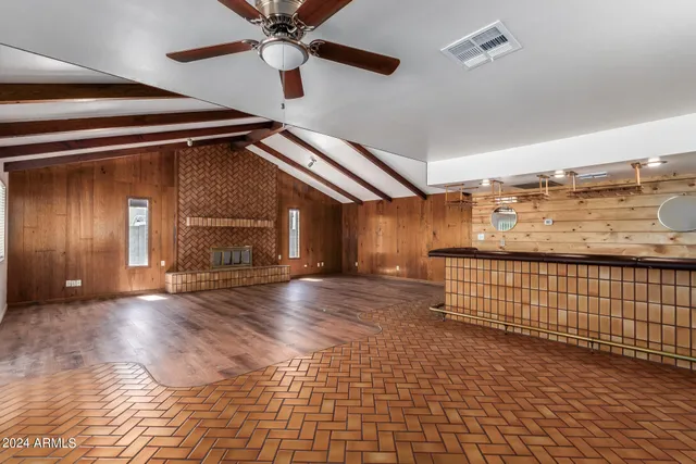 a view of a hallway with a kitchen