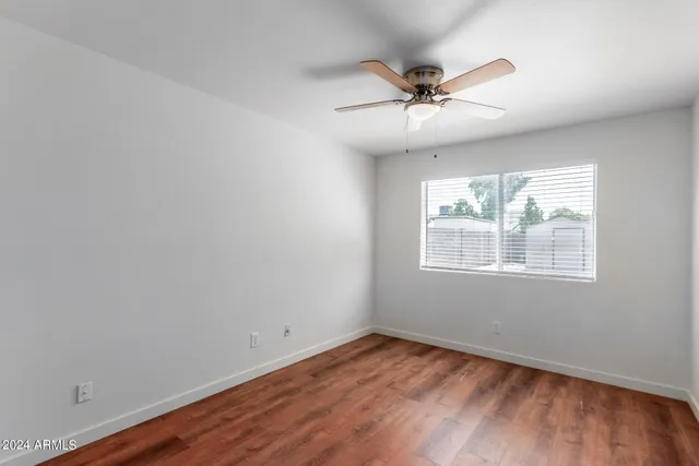 a kitchen with stainless steel appliances granite countertop a stove and cabinets