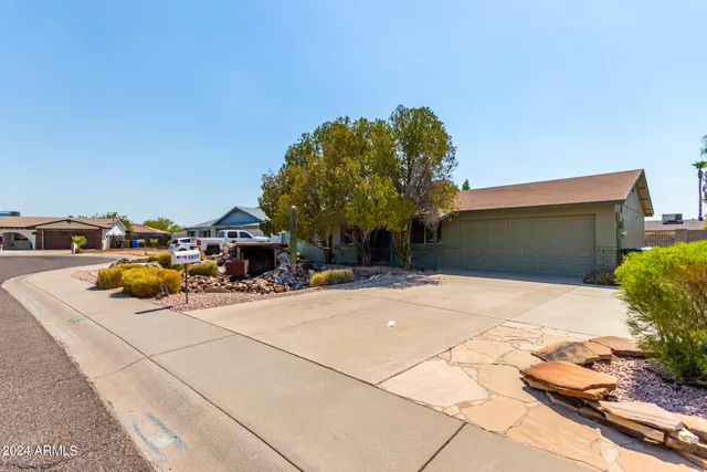 a group of cars parked on the side of street