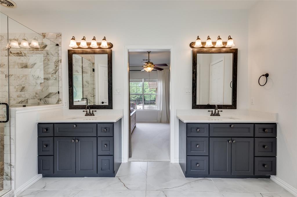 251 Pecan Hollow Circle Anna, TX 75409 - Photo 11 of 12 a bathroom with a double vanity sink mirror and