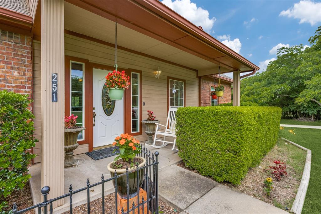 251 Pecan Hollow Circle Anna, TX 75409 - Photo 2 of 12 a view of a house with patio