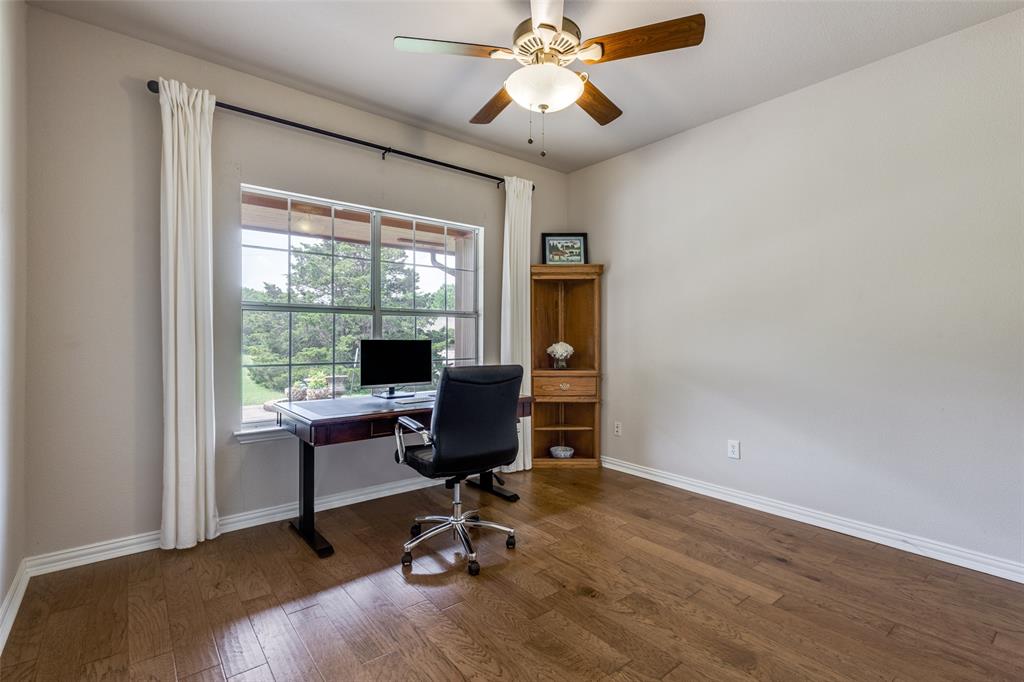 251 Pecan Hollow Circle Anna, TX 75409 - Photo 7 of 12 a view of a workspace with furniture and a window