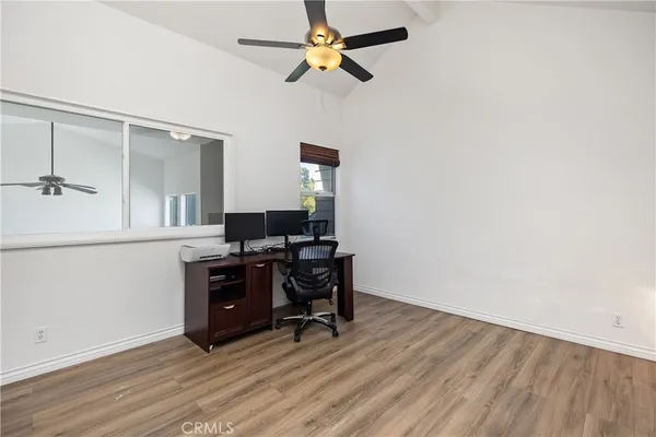 a view of workspace with wooden floor
