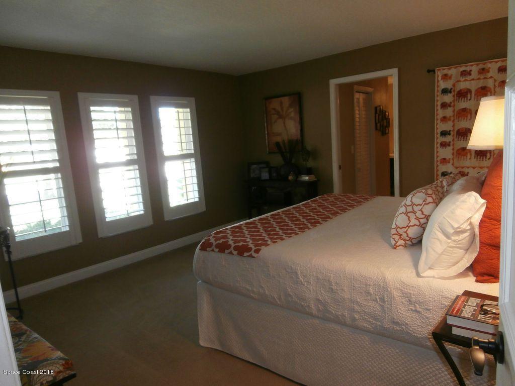 684 Caribbean Road Satellite Beach, FL 32937 - Photo 13 of 14 Master bedroom