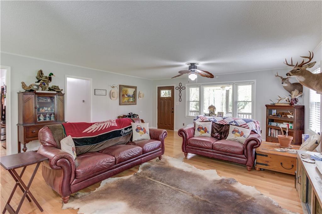 207 Boogers Hill Road Oxford, GA 30054 - Photo 13 of 39 a living room with furniture and a couch