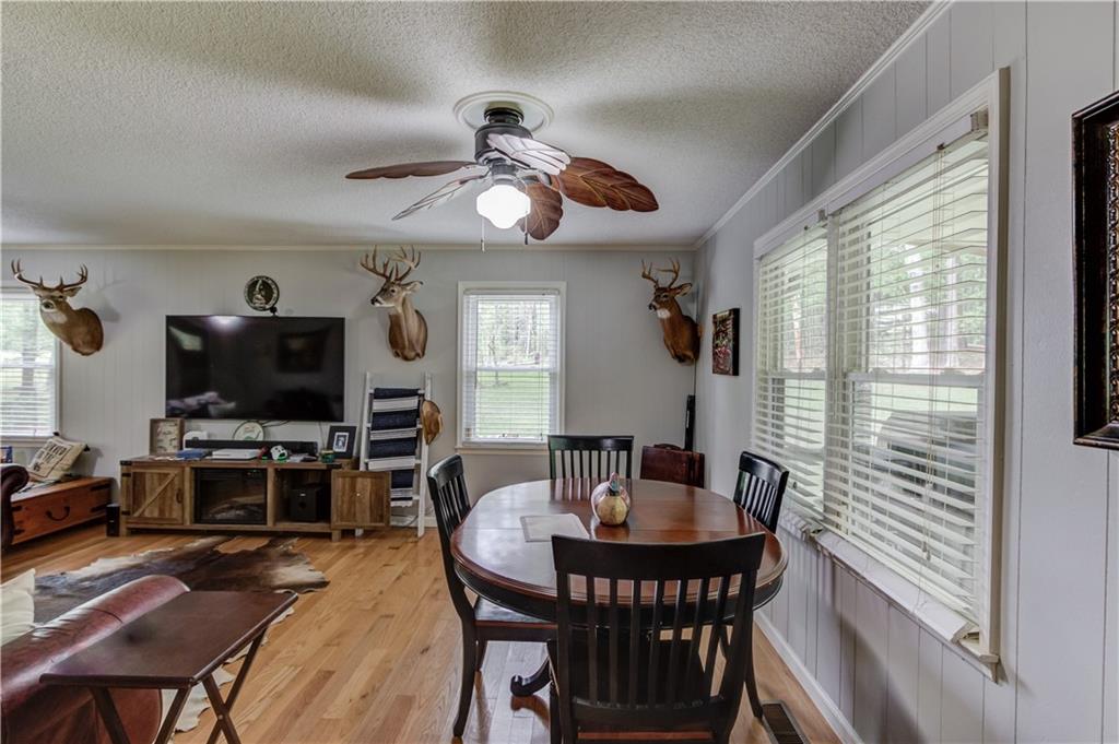 207 Boogers Hill Road Oxford, GA 30054 - Photo 14 of 39 a view of a dining room with furniture window and outside view