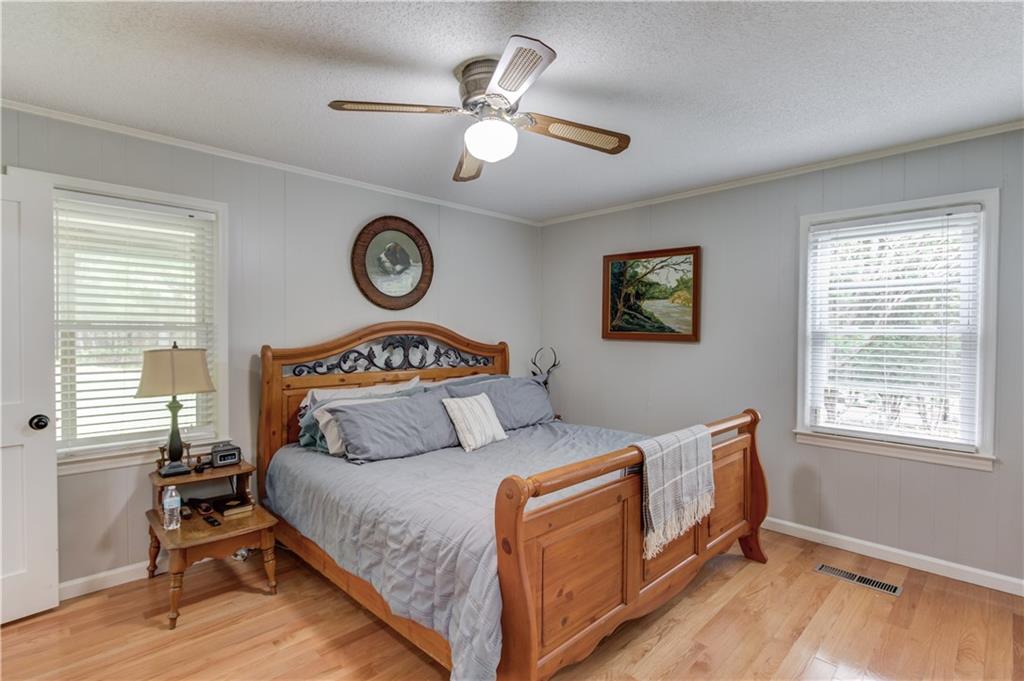 207 Boogers Hill Road Oxford, GA 30054 - Photo 18 of 39 a bedroom with a bed and a window