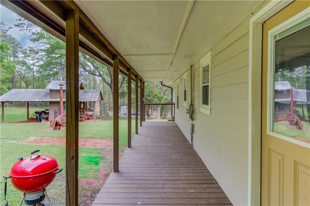 207 Boogers Hill Road Oxford, GA 30054 - Photo 3 of 39 a view of a porch with furniture
