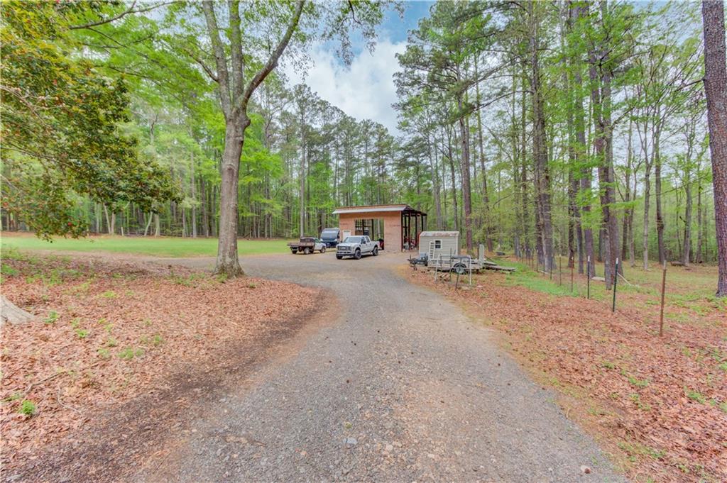 207 Boogers Hill Road Oxford, GA 30054 - Photo 38 of 39 a view of a park with swings and slides