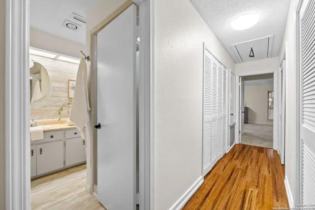 a bathroom with a tub and shower