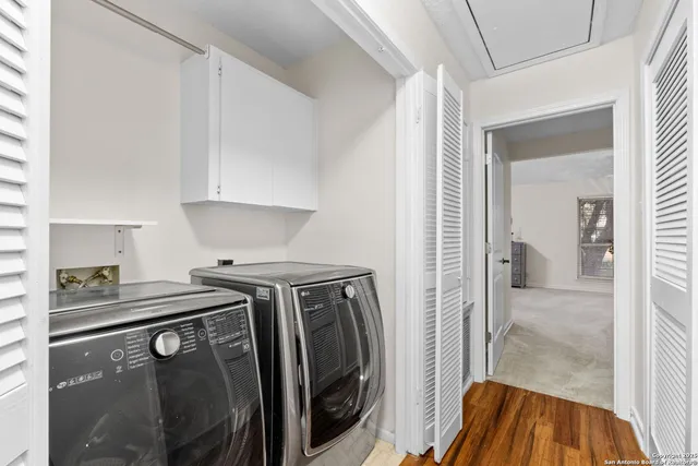 a utility room with dryer and washer