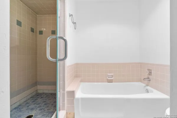 a bathroom with a white bath tub