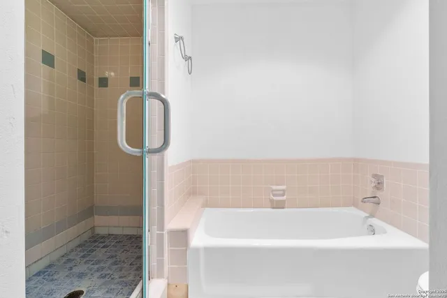 a bathroom with a white bath tub