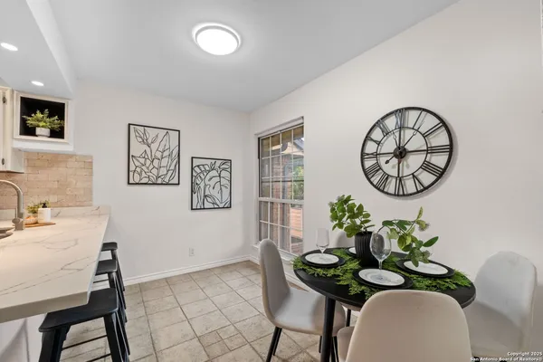 a view of a dining room with furniture