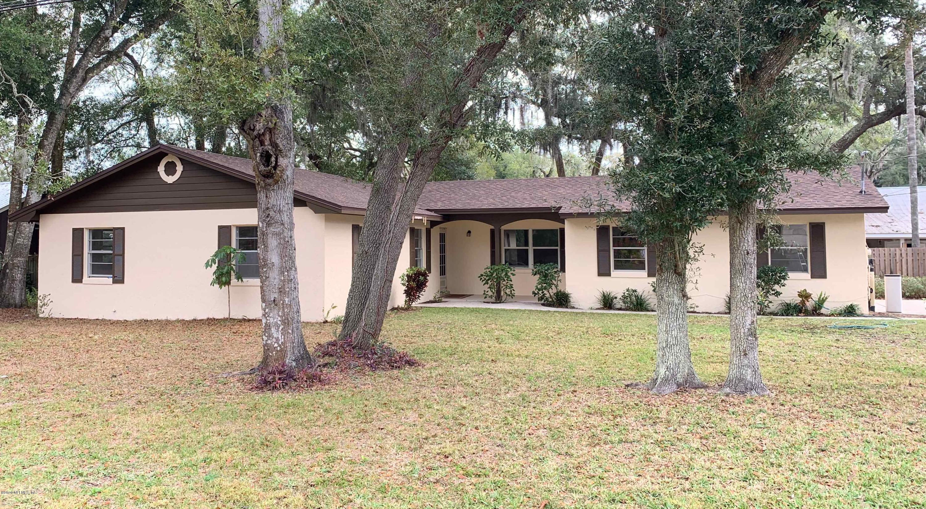 111 Cypress Road St. Augustine, FL 32086 - Photo 1 of 10 a front view of a house with a yard