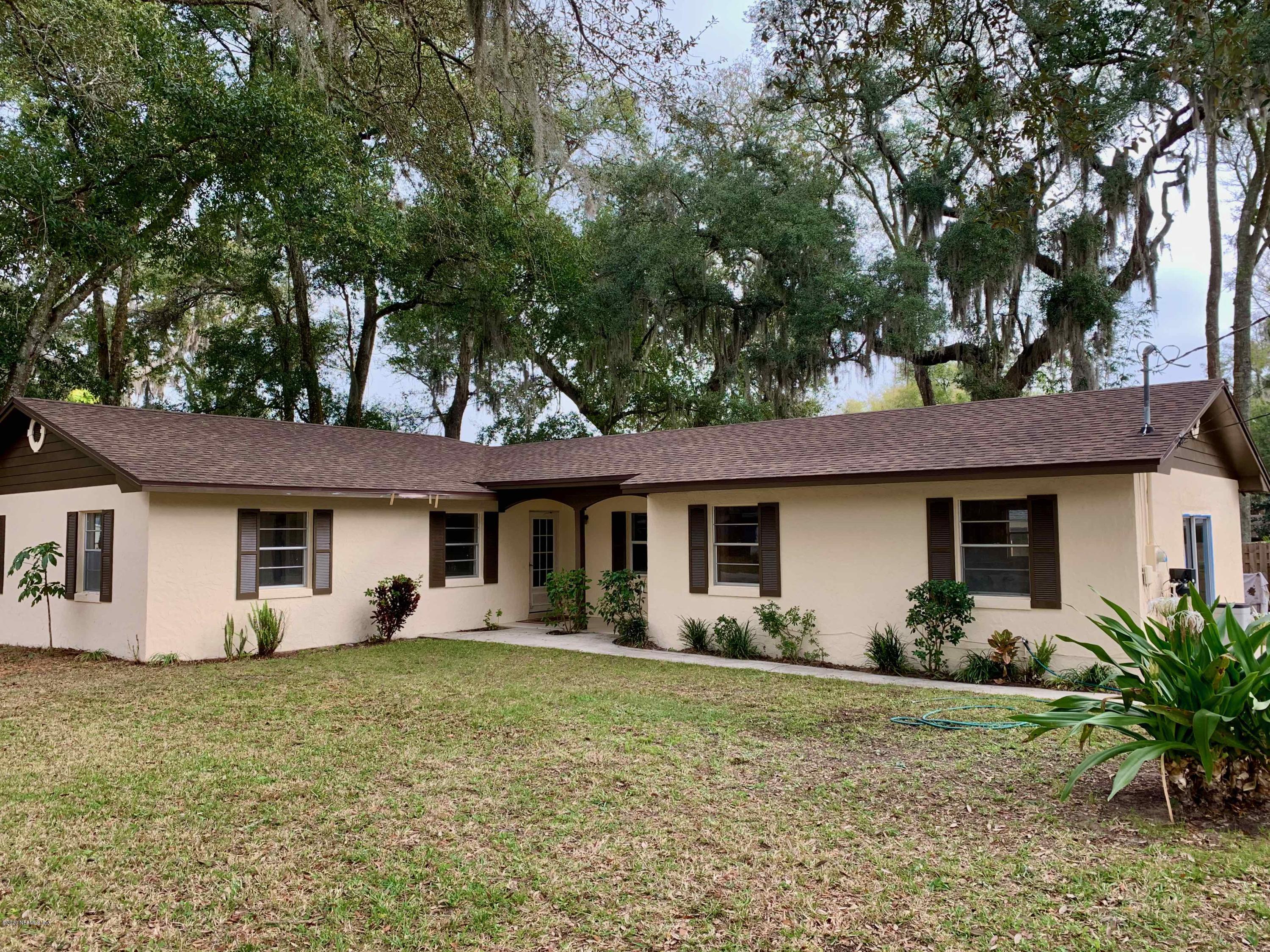 111 Cypress Road St. Augustine, FL 32086 - Photo 7 of 10 a front view of house with yard and green space