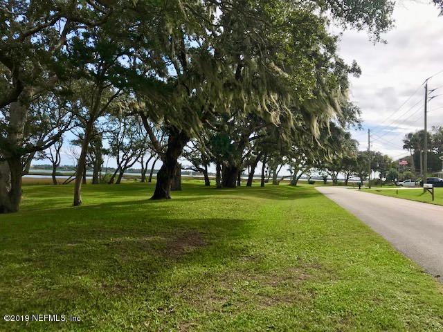 111 Cypress Road St. Augustine, FL 32086 - Photo 10 of 10 a huge green field with lots of trees