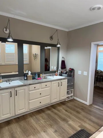 a view of swimming pool with a yard and lake view